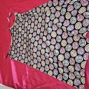 Spaghetti strap shortress with hearts on it.